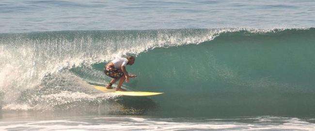 Greg Miller Tuberide with longboard